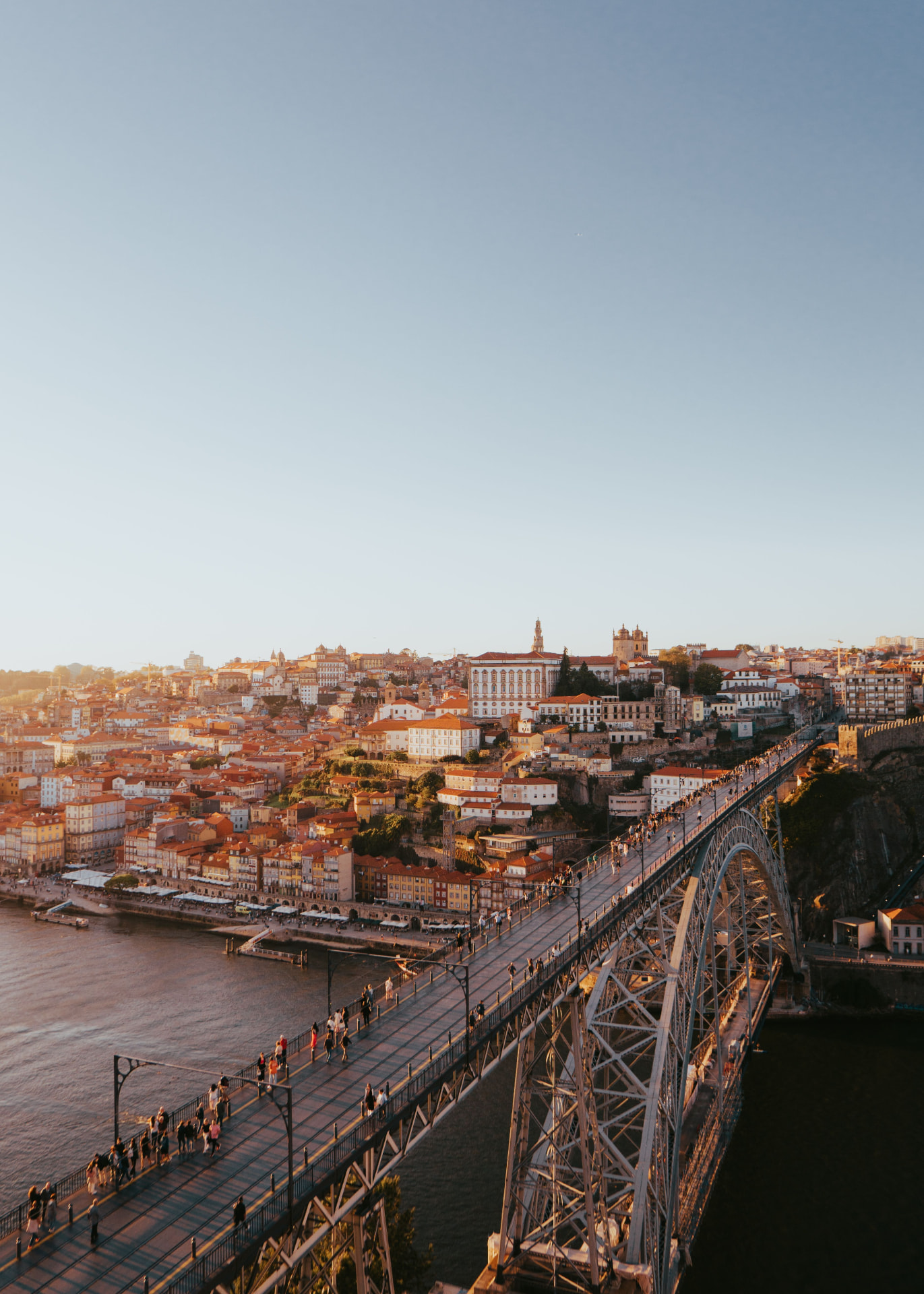 The Dom Luís I Bridge over the Douro River in Porto at golden hour
